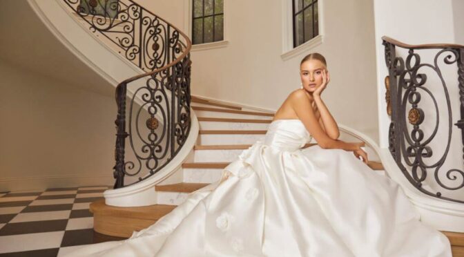 Bride in a Casablanca Bridal gown with intricate lace details