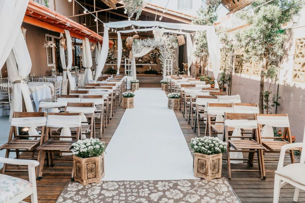 Beautiful wedding venue decorated with elegant lighting, flowers, and romantic ambiance
