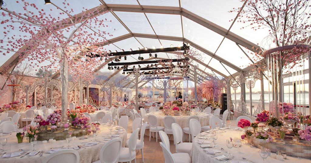 Event planner arranging wedding décor elements for a memorable ceremony atmosphere